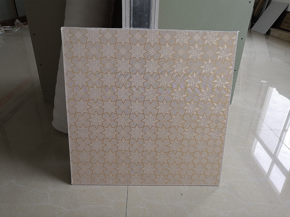 Laminated gypsum ceiling tiles
